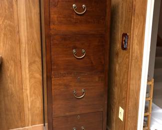 Wood 4 drawer file cabinet. H: 57in | W: 20.5in | D: 17.1/4in