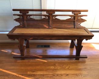 Beautifully handcrafted Antique Chinese 'village bench' with high back, foot rest, wicker inset seat. Measures approx. W: 60.3/4in | Seat D: 14.5in | Base D: 19.1/4in | H: 35.5in.