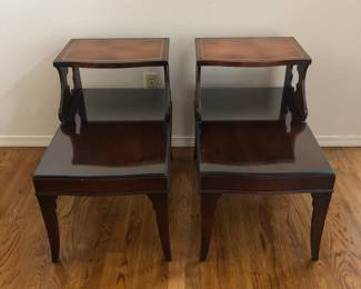 Vintage leather top step end tables in excellent condition.
