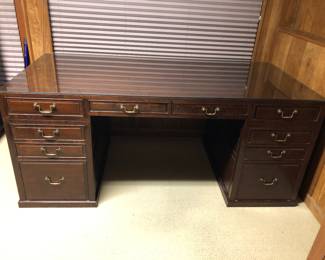 Executive Style Desk finished on all 4 sides. L:72in | D: 34in | H 30 in. The desk comes apart in 3 parts for easier moving (Part 1: Desk top with the 4 drawers across is one unit. Part 2: Left bank of 3 drawers is one unit. and Part 3: Right bank of 3 drawers is one unit.)