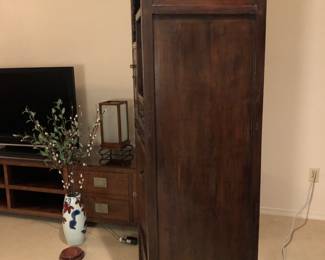 Showing side view of display cabinet.