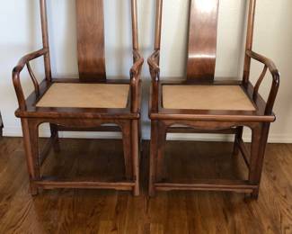 2 Walnut dining armchairs with wicker inset seat. (Selling with the dining table)