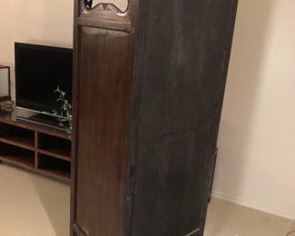 Showing side view of display cabinet.