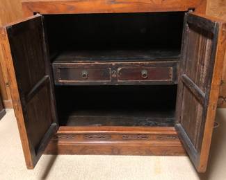 Interior view of antique Chinese cabinet.