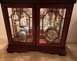 #5 Pulaski Furniture Carved Wood Display Cabinet with 2 glass doors & 1 shelf with plate rack, lighted 35.5x13Dx31T $125.00 #6 Mirror Carved Heavy Beveled Mirror - 27x48 $100.00
