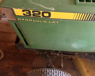 #50	John Deere 320 Hydraulic Lift Riding Mower - 48" Cut (needs battery)	 $400.00 
