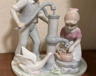 Porcelain Boy and Girl  AT Water Well Figurine