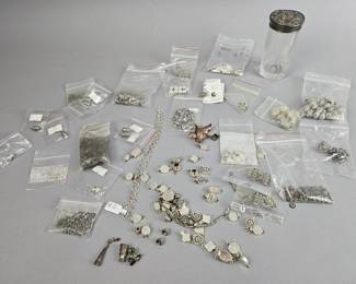 Lot 187 | Sterling Silver Charms, Clasps, and More