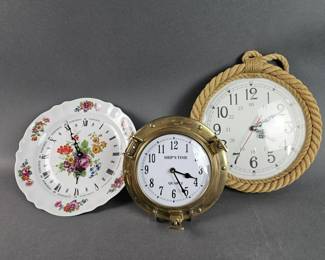 Lot 269 | Vintage Porthole Wall Clock and More