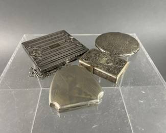 Lot 128 | Antique Compacts, Lighter, & Cases