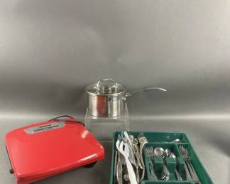Lot 342 | Assorted Flatware , David Burke Pan & More