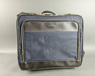 Lot 322 | Vintage Eddie Bauer Suitcase