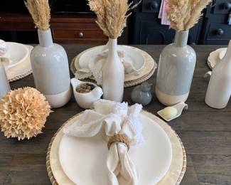 Vases $10-20
Mother of Pearl Chargers $8
Seagrass Chargers $7
Dining Table $750 
Sitting bench $125