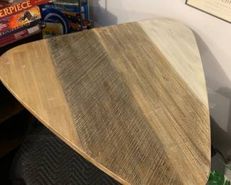 Unique shaped guitar pick style wood table
$150