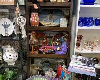 Native American Doll $65
Pottery $5-75
Fish mirror $25
Wood shelf  $85 