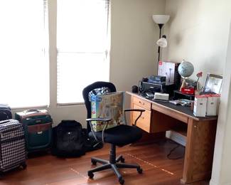 Desk, chair, suitcases