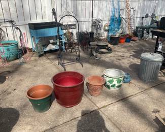 THE DRIVEWAY IS LOADED WITH GARDEN DECOR