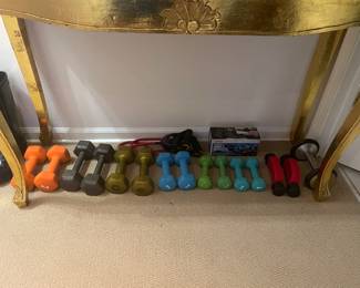 A set of hand weights and ankle weights