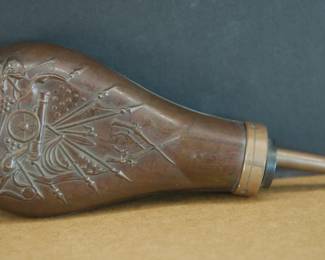 Side view of Civil War Era military gun powder flask
