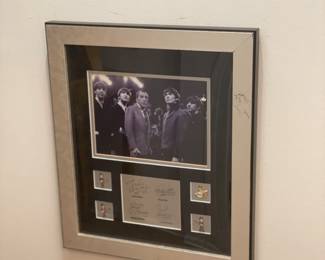 Signed, matted, and framed photo of The Beatles
