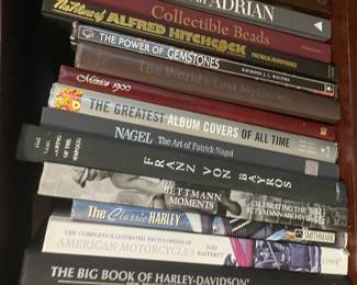 Book collection including: "Gowns by Adrian", "Collectable Beads", "Alfred Hitchcock", "The Power of Gemstones", "The Worlds Last Mysteries", "Mexico 1900", "The Greatest Album Covers of All Time", "The Art of Patrick Nagel", "Franz Von Bayros", "Bettman Moments", "The Classic Harley", "The Complete Illustrated Encyclopedia of American Motorcycles", "The Big Book of Harley-Davidson"