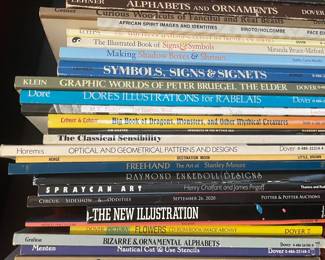 Book collection including: "Alphabets and Ornaments", "Curious Woodcuts of Fanciful and Real Beasts", "African Spirit Image and Identities", "930 Matchbook Advertising Cuts of the Twenties and Thirties", "The Illustrated Book or Signs & Symbols", "The Making of Shadow Boxes and Shrines", "Symbols, Signs, and Signets", "Graphic Worlds of Peter Bruegel, The Elder", 'Dore's Illustrations for Rabelais", "MC Escher: The Graphic Work", "Big Book of Dragons, Monsters, and Other Mythical Creatures", "Journeys in the Mythic Sea", "The Classical Sensibility", "Optical and Geometrical Patterns and Designs", "Destination Moon", "Freehand", "Raymond Enkeboll Designs", "Spraycan Art", "Circus Sideshow, and Oddities", "The New Illustration", "Mexico: The Culture", ""Flowers", "Bizarre & Ornamental Alphabets", "Nautical Cut & Use Stencils"