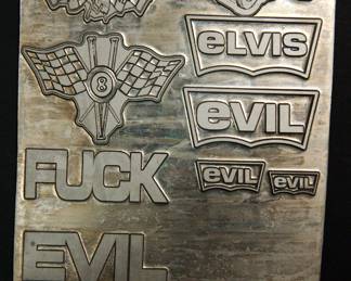 Another detail of metal plates used as models when The Alley made statuary products for many major rocks groups, including AC/DC, The Ramones, The Rolling Stones, Pantera, Garbage, and Dead Kennedys