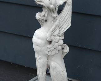 Griffin white stone sculpture
