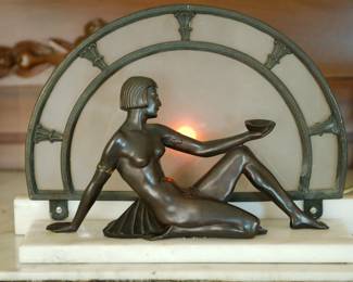 Art Deco bronze and marble lady in front of a clock lamp