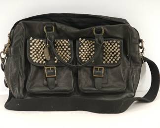 Black Leather Fossil crossbody bag with spike studs on the pockets
