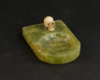 Green Jade ashtray with a skull figurine