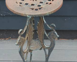 Top view cast iron plant stand with three Griffin legs