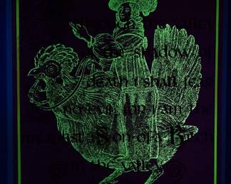 Under a blacklight, overprint of "Top This" copyright 1969 Celestial Arts CA37 and "Yea, though I walk through the valley of the shadow of death I shall fear no evil: for I am the meanest Son-of-a-Bitch in the valley" copyright 1970 by Celestial Arts CA605, screen-printed blacklight poster, part of "The Overprints" made in the late 1960's/early 1970s by Joe McHugh, Nick Nickolds, and Sätty