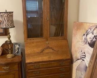 Drop front secretary desk with display hutch from a matching antique early 1900s Victorian oak bedroom set