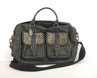 Another view of black Leather Fossil crossbody bag with spike studs on the pockets
