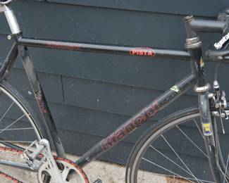 Detail of Black Bianchi men's road bicycle with Syntace handlebars