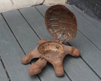 Interior of cast iron turtle spittoon
