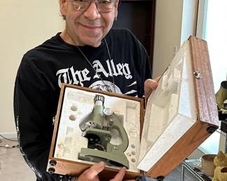 Mark Thomas, owner of The Alley and these items, shows off his treasures