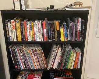 Another small bookshelf full of history and cookbooks