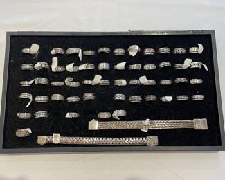 Collection of sterling silver rings and bracelets