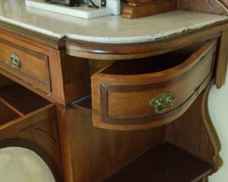 Side drawer detail of gorgeous antique oak and marble top sideboard
