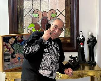 Mark Thomas, owner of The Alley and these items, shows off his treasures