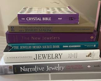 Jewelry Making book collection including: "The Crystal Bible", "The Penland School of Crafts: Book of Jewelry Making", "The New Jewelers", "The Jewelry Design Sourcebook", Understanding Jewelry", and "Narrative Jewelry"