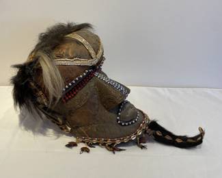 Side view of wood African tribal mask