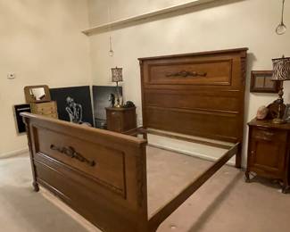 Bed frame from a matching antique early 1900s Victorian oak bedroom set
