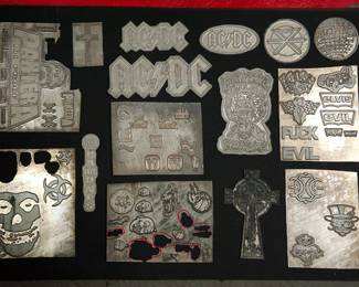 Another view of metal plates used as models when The Alley made statuary products for many major rocks groups, including AC/DC, The Ramones, The Rolling Stones, Pantera, Garbage, and Dead Kennedys
