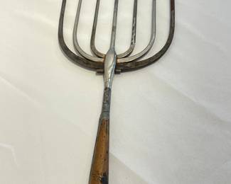 Antique metal seven-pointed pitchfork