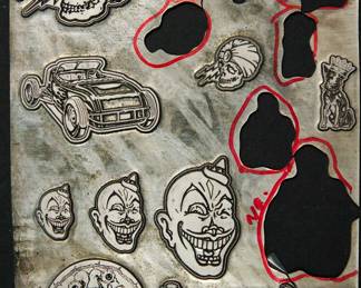 Detail of metal plates used as models when The Alley made statuary products for many major rocks groups, including AC/DC, The Ramones, The Rolling Stones, Pantera, Garbage, and Dead Kennedys