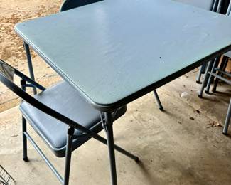 Card table with padded chairs