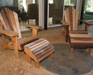 Pair of Adirondack chairs with foot rests